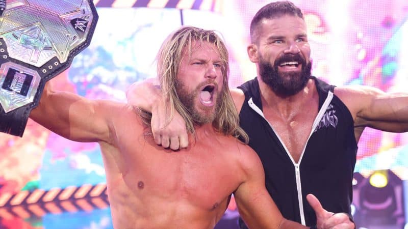 Dolph Ziggler and Robert Roode celebrate Ziggler winning the NXT title on tonight's NXT Roadblock.