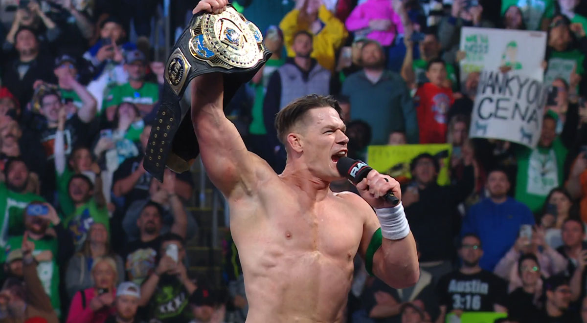 John Cena celebrates winning the WWE Intercontinental Championship on RAW 